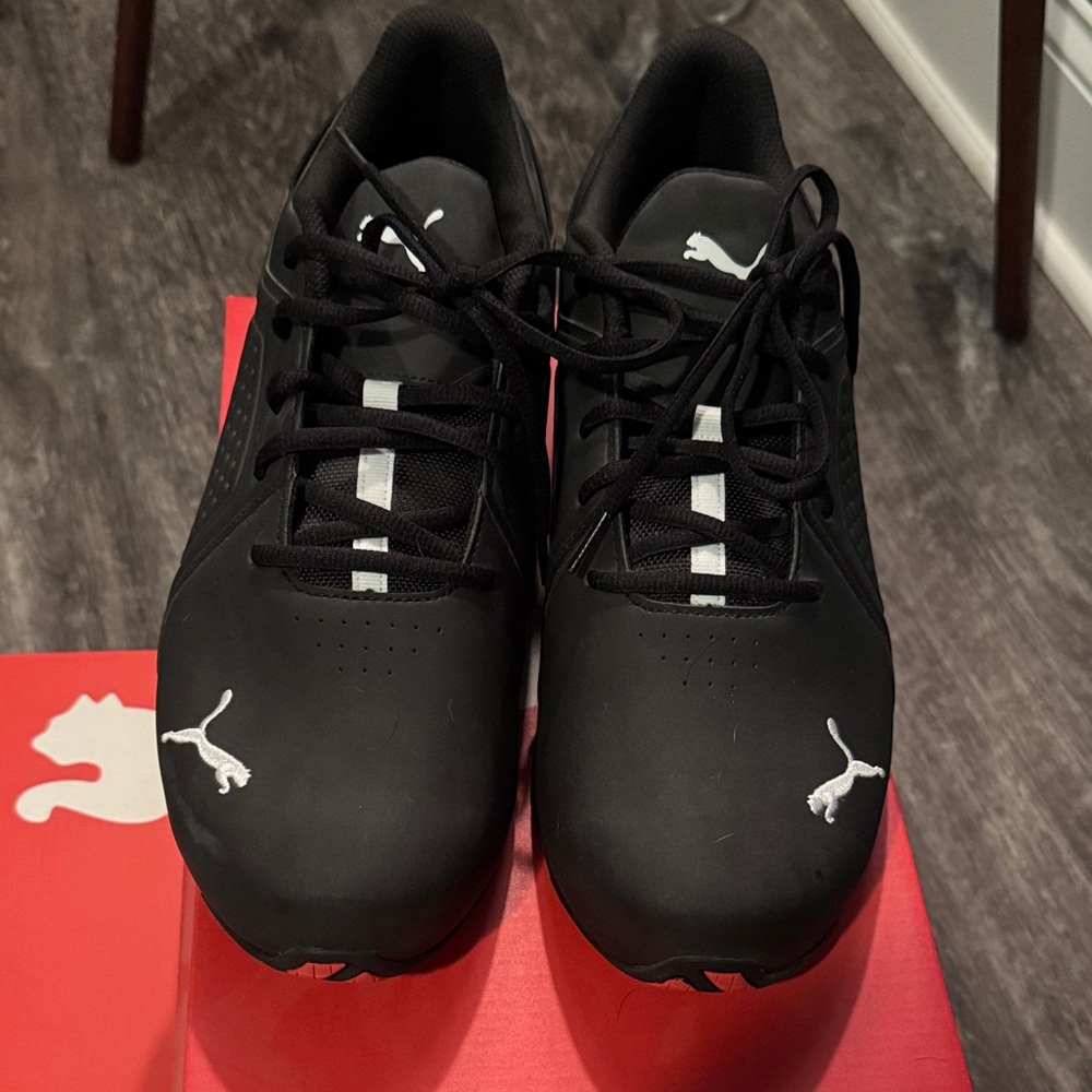 Puma Men's Black Sneakers with White Accents.